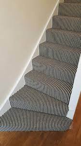 grey carpet as a runner to stairs