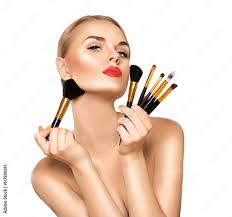 beauty woman with makeup brushes