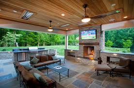 A Fireplace In A Screened In Porch