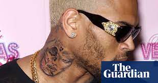 Wolf neck tattoo best tattoo ideas. Chris Brown S New Tattoo Is Sickening Chris Brown The Guardian