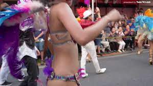 A young woman paraded in a erotic costume and dance at samba carnival, and  she has good courage! Story Viewer 