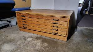 wood flat file cabinet in