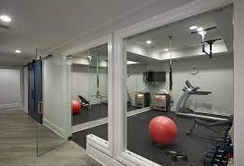 Glass Door Opens To A Basement Home Gym