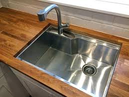 Ashlee and cody walk through how to remove an old. Installing Undermount Kitchen Sink How To Install Kitchen Sink Faucet Sink Mounting Clips Beautiful Undermount Kitchen Sinks Sink Faucets Kitchen Sink Faucets