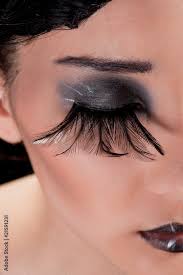 extreme makeup with feather eyelashes