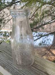 Pint Clear Glass Embossed Milk Bottle