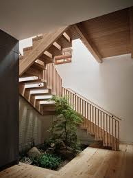 eight sculptural wooden staircases that
