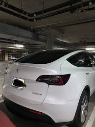 tesla model y with white seats spotted