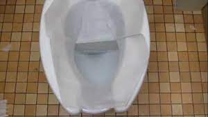Compressed wood is used in the toilet seat cover production. How Are You Supposed To Use A Toilet Seat Cover Where Does The Flap Go Mental Floss
