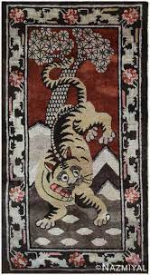 antique tibetan rug with tiger design