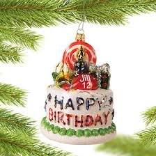 Birthday cakes are often layer cakes with frosting served with small lit candles on top representing the celebrant's age. Personalized Birthday Cake Christmas Ornament