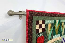 how to hang a quilt on the wall the