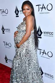 pregnant keke palmer cradles her