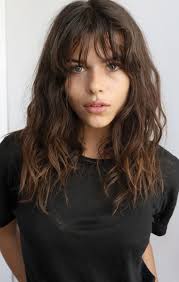 If you thought curly bangs were a bold choice, how about a blunt asymmetrical cut? Pin On Hair