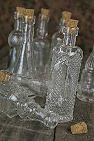 glass bottles with corks bud vases