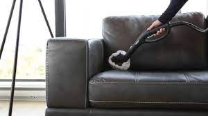 leather sofa with a steam cleaner