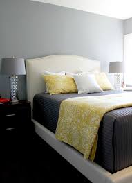 Gray Yellow And White Bedding On A