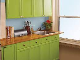 Tip up a straight countertop to apply the adhesive. 10 Ways To Redo Kitchen Cabinets Without Replacing Them This Old House
