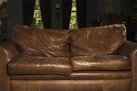 fix flat cushions on a leather sofa