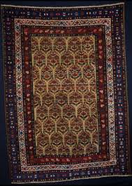 antique kurdish rug with yellow ground