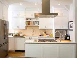 The spotless white floors go well with these raised wall cabinets. White Kitchen Cabinets Pictures Options Tips Ideas Hgtv
