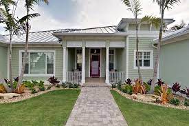 These colors may be the basic colors of classic american homes but these colors provide a simple combination and look to the house. 23 Landscape Ideas To Have A Good Appeal For Front Yard Home Design Lover Florida Homes Exterior Home Exterior Makeover Ranch House Exterior