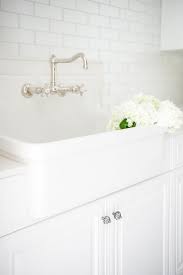 laundry room farmhouse sink with subway