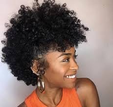 This cute natural updo with a braided mohawk in mind is great if you want to extend short natural hair in order to protect it and get a beautiful style, suitable for medium length hair. Top 30 Black Natural Hairstyles For Medium Length Hair In 2020