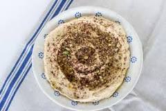 Why do you add ice water to hummus?