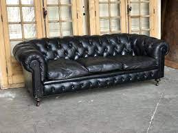 black leather sofa chesterfield