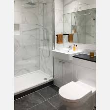 If you have windows in bathroom paint the frames white for matching the theme and tone of your bath space. Place White Marble Effect Wall Tiles Tiles From Tile Mountain