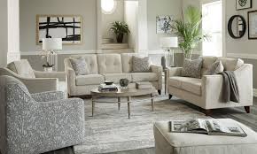 The matching floor rug and pillows add to the brightness, and in the center sits a low wooden tea table for contrast. Oliver Cream 3 Piece Living Room Set The Dump Luxe Furniture Outlet