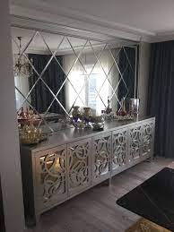 Mirror Tiles In The Living Room Wall
