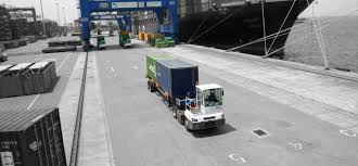 Your average shipping container weighs ~3.5 tonnes (metric or long imperial). Tractors Mafi Transport Systeme Gmbh