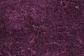 purple fluffy carpet texture of textile