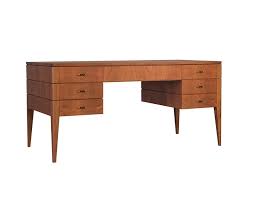 The desk allows 2 people to work side by side without compromising on space. Double Sided Desk In Cherry Wood Idfdesign