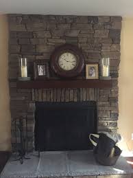 Uneven Sides Of Stone Veneer Fireplace