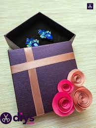 decorate a gift box with paper flowers