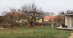 man flying in his homemade drone