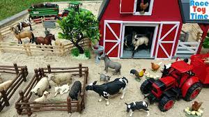 farm toys in the sandbox you