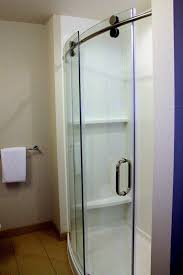 curved glass shower door with visible