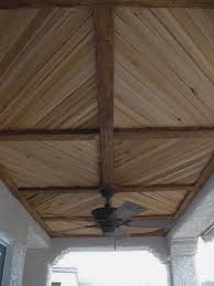 faux wood beam and plank ceiling