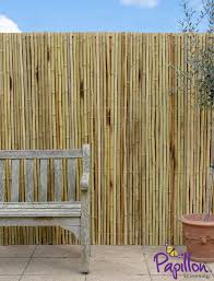 thick white bamboo fencing screening