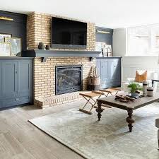 Brick Fireplace With Built In Cabinets