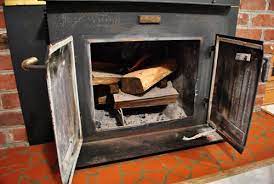 removing a woodstove insert