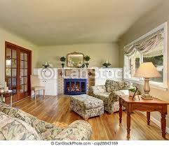 We analyzed 916,645 living room designs and from that data set were able to determine what are the most popular living room styles. Darling Living Room With Green Walls And Floral Sofas Darling Living Room With Green Walls A Fire Place And Floral Canstock
