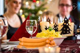 While the german part of that equation would usually run to celebrating on christmas eve, it's been the british part which has won out for several my wife, however, is estonian, and has therefore always had a big meal on christmas eve for dinner. Traditional German Christmas Eve Dinner Wiener Sausages And Potato Stock Photo Picture And Royalty Free Image Image 33473513