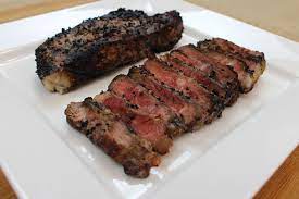 Never pierce the skin of the steaks with a fork! Caveman Grilled New York Strip Steaks Seven Sons Farms