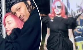 To top it, she chooses to go sans. Madonna Sets A Mood Posing In Black With Pink Hair In Front Of A Fence With Bf Ahlamalik Williams Daily Mail Online