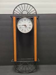 Howard Miller Metal Wall Clocks With